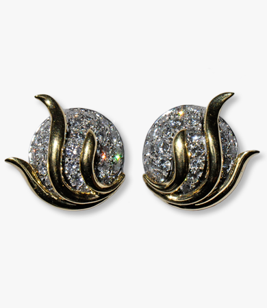A pair of white and yellow gold and diamond '70s earclips | Statement Jewels