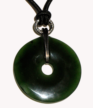 New Zealand greenstone pendant with 18k blackened white gold, tsavorites and rosecut diamonds | Statement Jewels